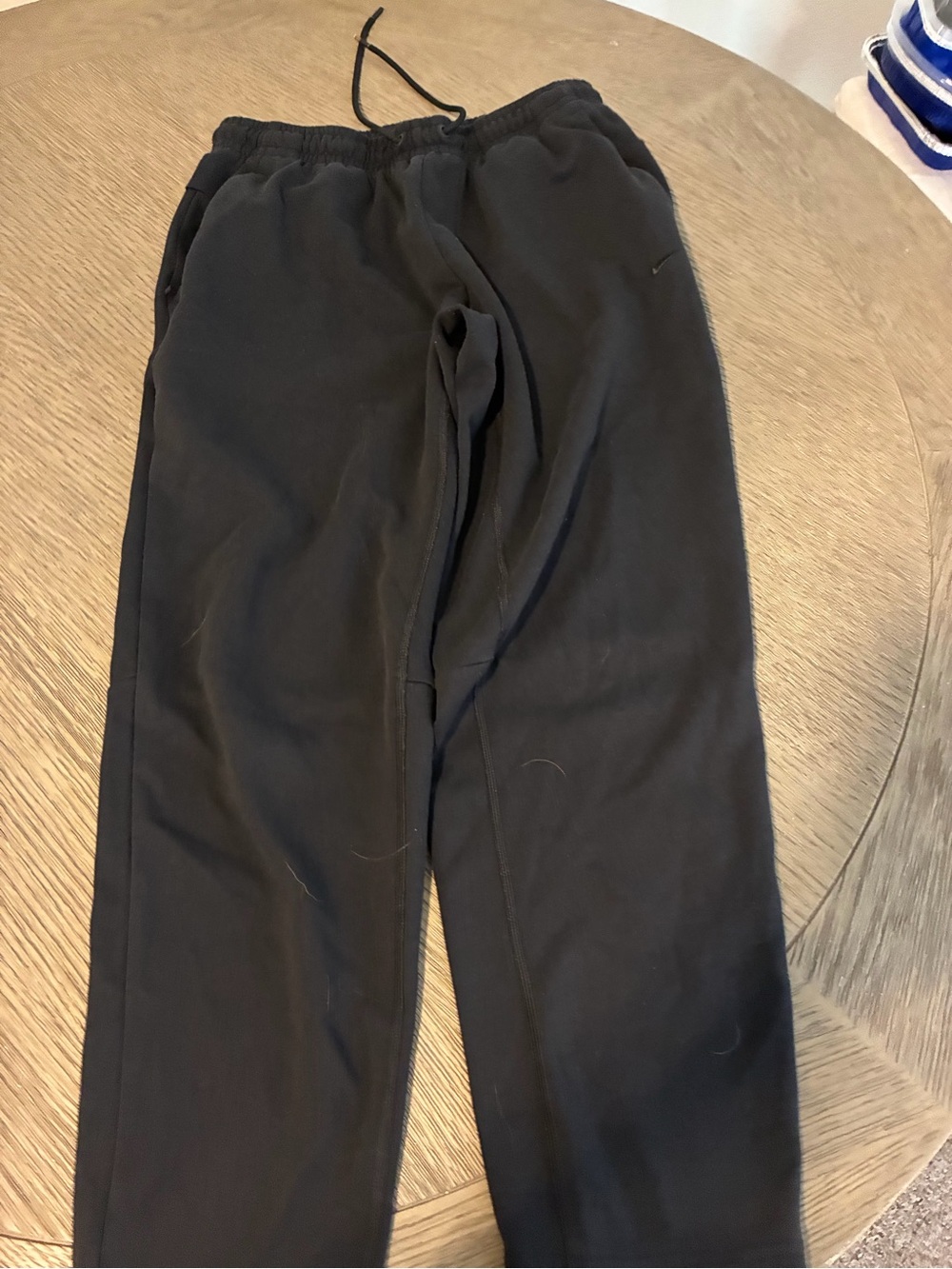 Nike Black Dri-FIT joggers with black Swoosh